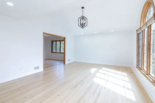 a view of an empty room and window