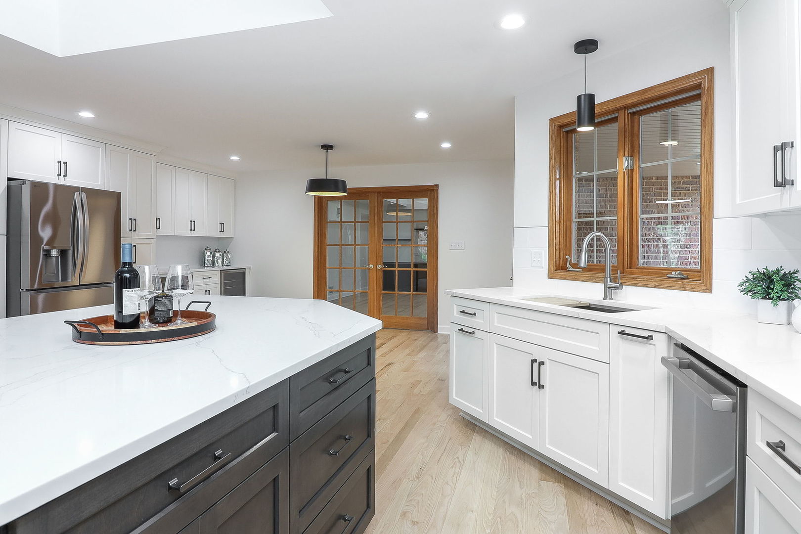1249 Cronin Court Lemont, IL 60439 - Photo 4 of 40 a kitchen with kitchen island granite countertop stainless steel appliances sink stove and cabinets
