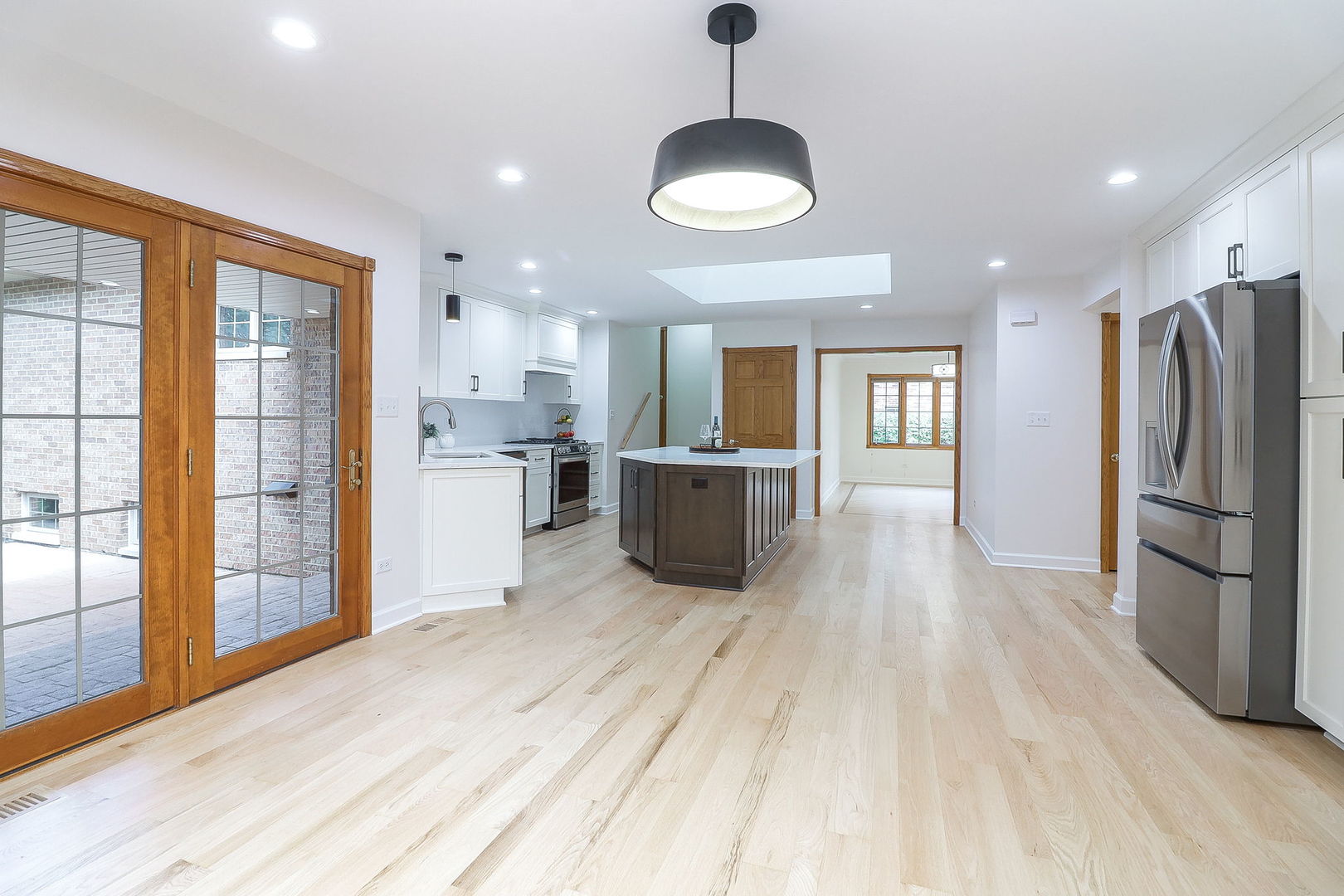 1249 Cronin Court Lemont, IL 60439 - Photo 5 of 40 a kitchen with stainless steel appliances granite countertop a refrigerator and a stove top oven
