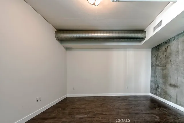 a view of a house with potted plants