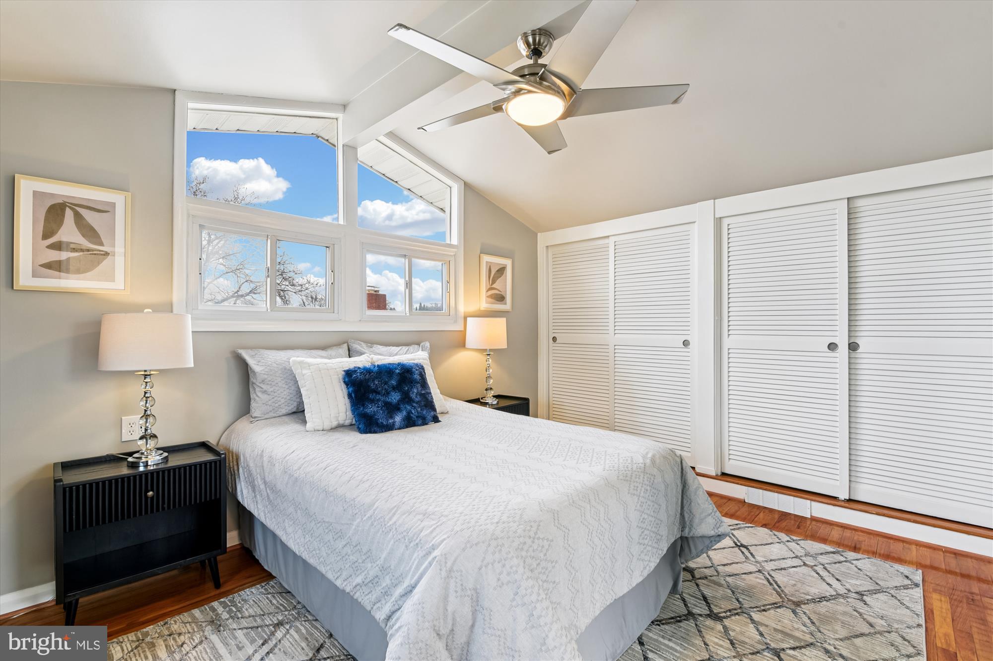 3309 Olympia Avenue Baltimore, MD 21215 - Photo 25 of 41 a bedroom with a bed and a lamp on the dresser