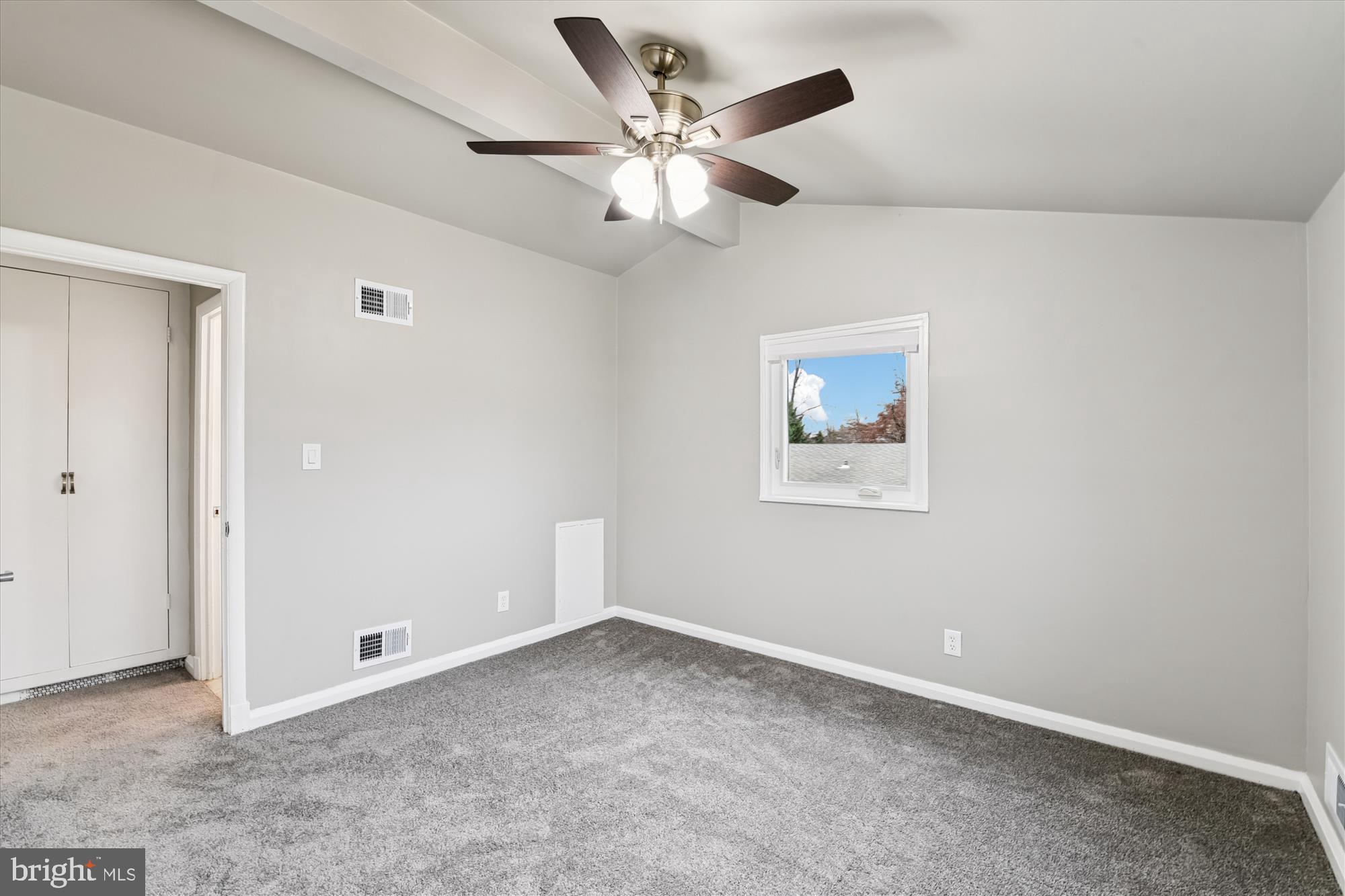 3309 Olympia Avenue Baltimore, MD 21215 - Photo 28 of 41 an empty room with ceiling fan and window