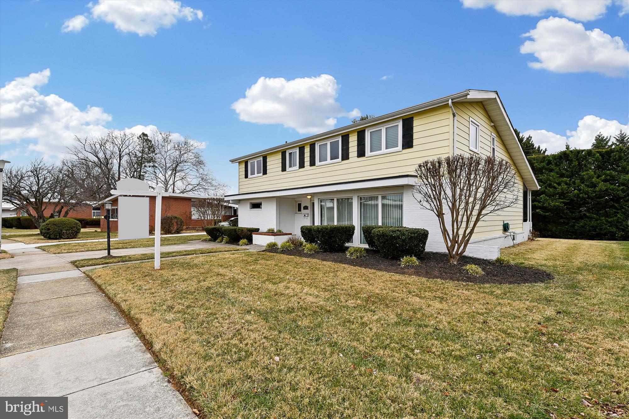 3309 Olympia Avenue Baltimore, MD 21215 - Photo 3 of 41 a front view of a house with a yard