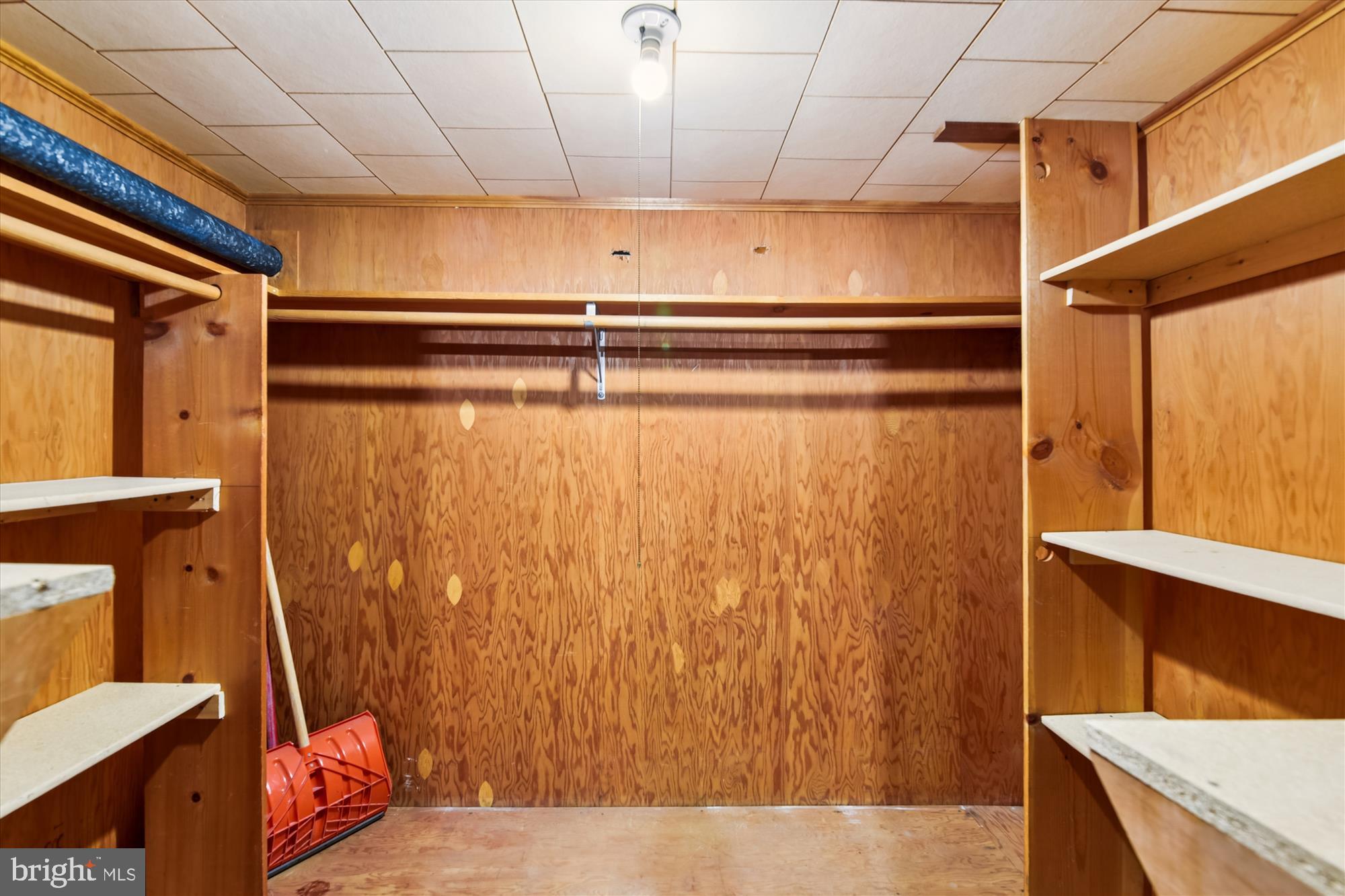 3309 Olympia Avenue Baltimore, MD 21215 - Photo 37 of 41 a view of walk in closet with clothes