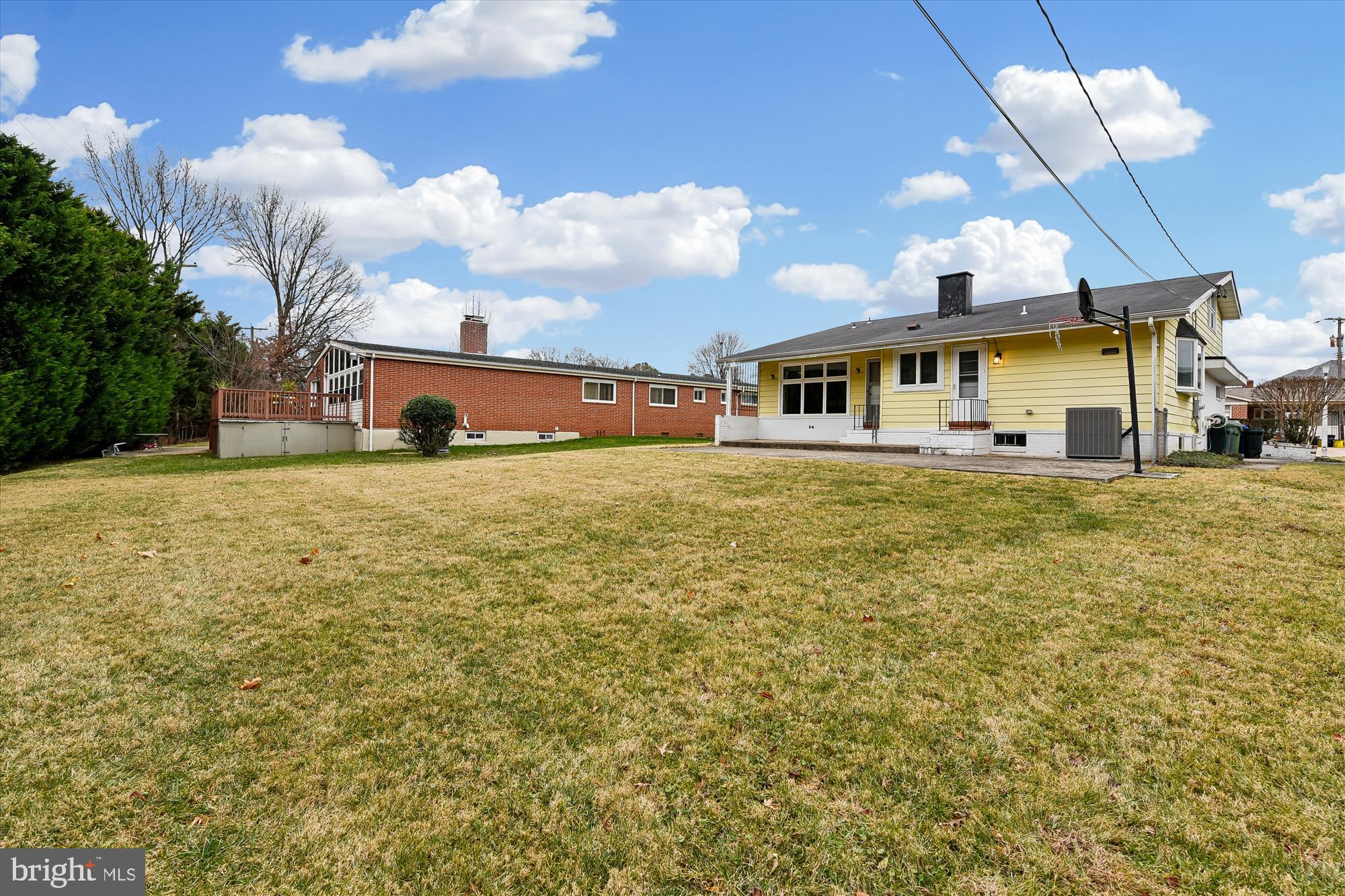 3309 Olympia Avenue Baltimore, MD 21215 - Photo 39 of 41 a view of a house with a big yard and large trees