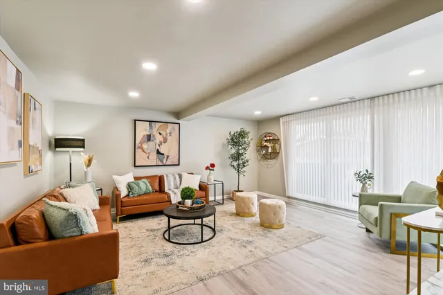 a living room with furniture and a couch