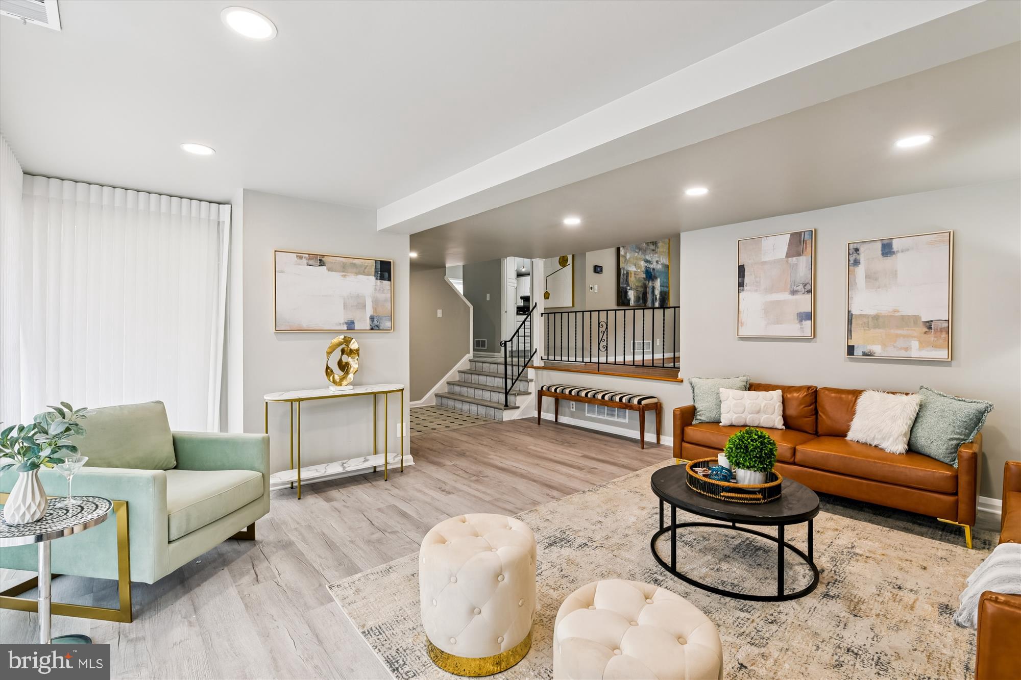 3309 Olympia Avenue Baltimore, MD 21215 - Photo 8 of 41 a living room with furniture a rug and a table