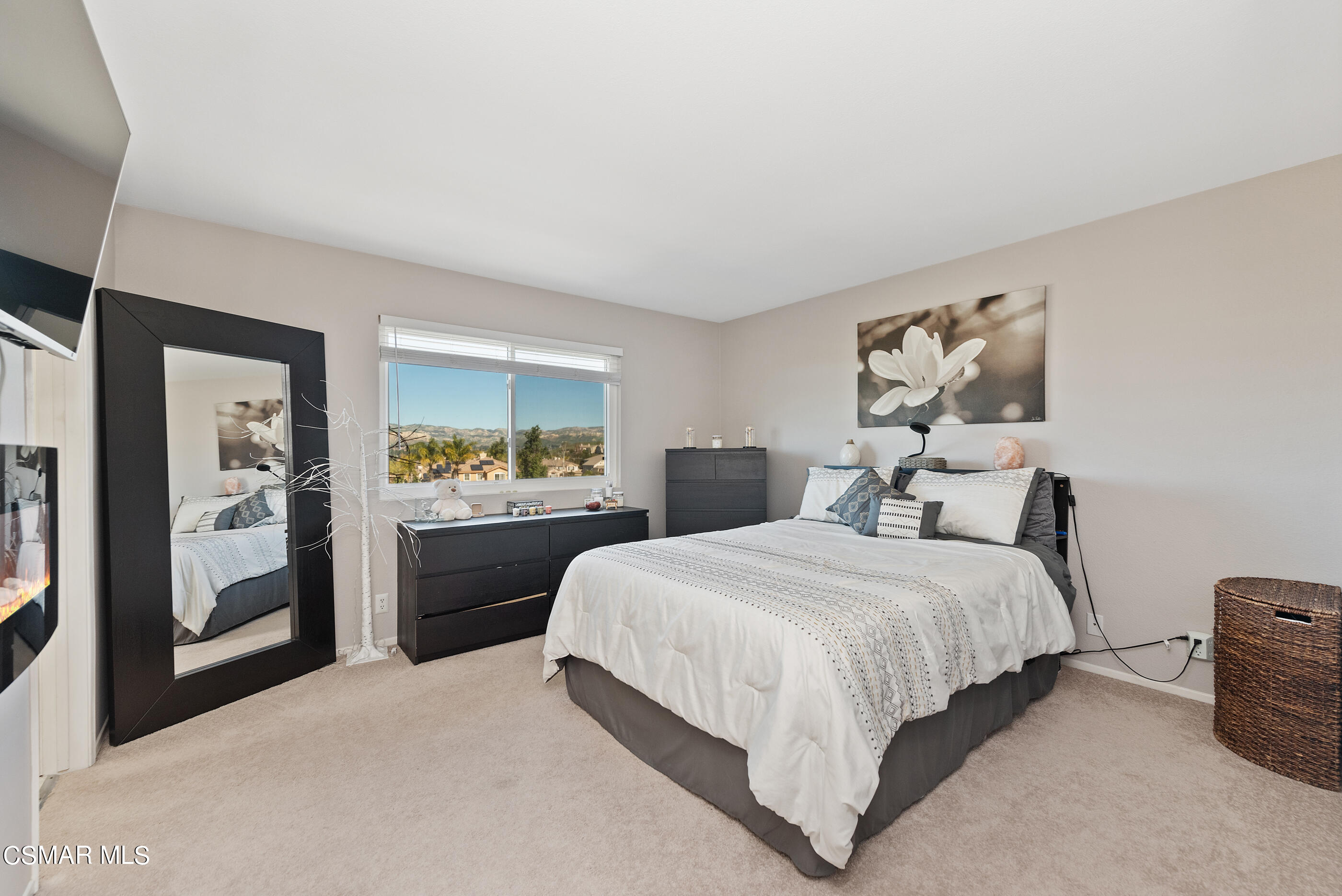 3369 Manorgate Place Simi Valley, CA 93065 - Photo 17 of 29 a bedroom with a bed and dresser