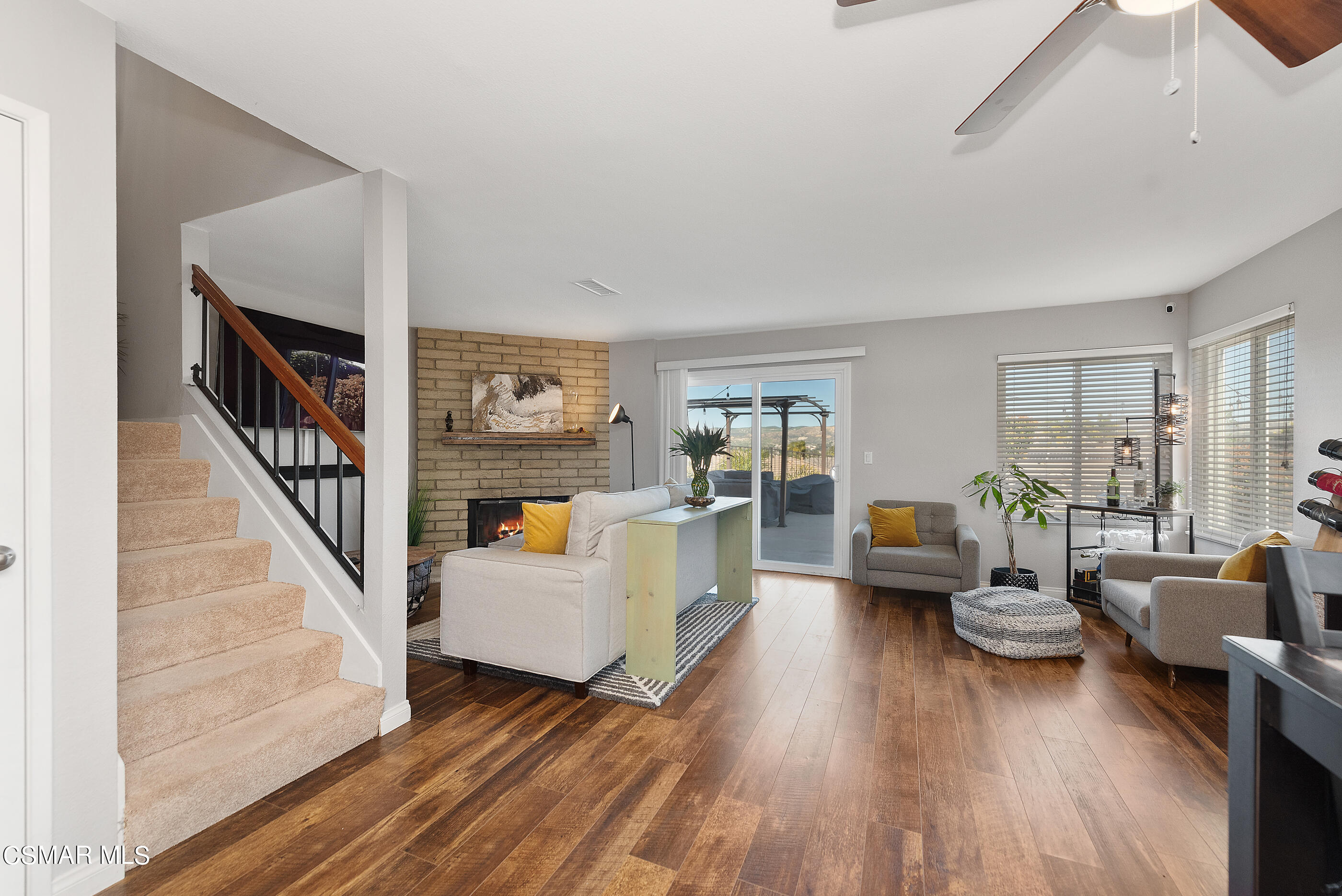 3369 Manorgate Place Simi Valley, CA 93065 - Photo 6 of 29 a living room with furniture and a wooden floor