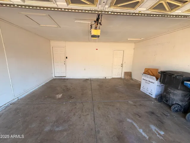 a living room with a couch and wooden floor