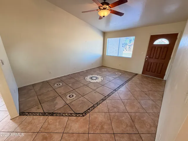 a view of an empty room and window