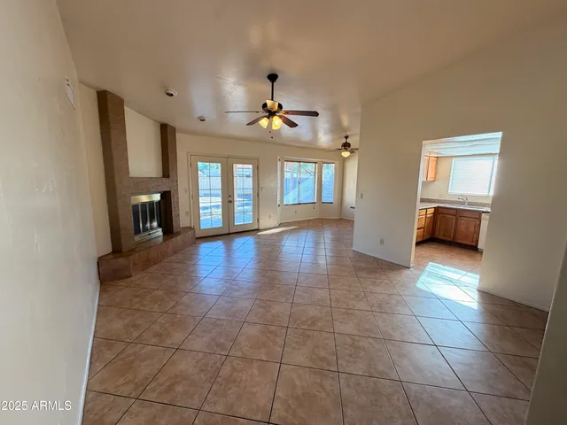 a view interior of a house an entryway and fire place