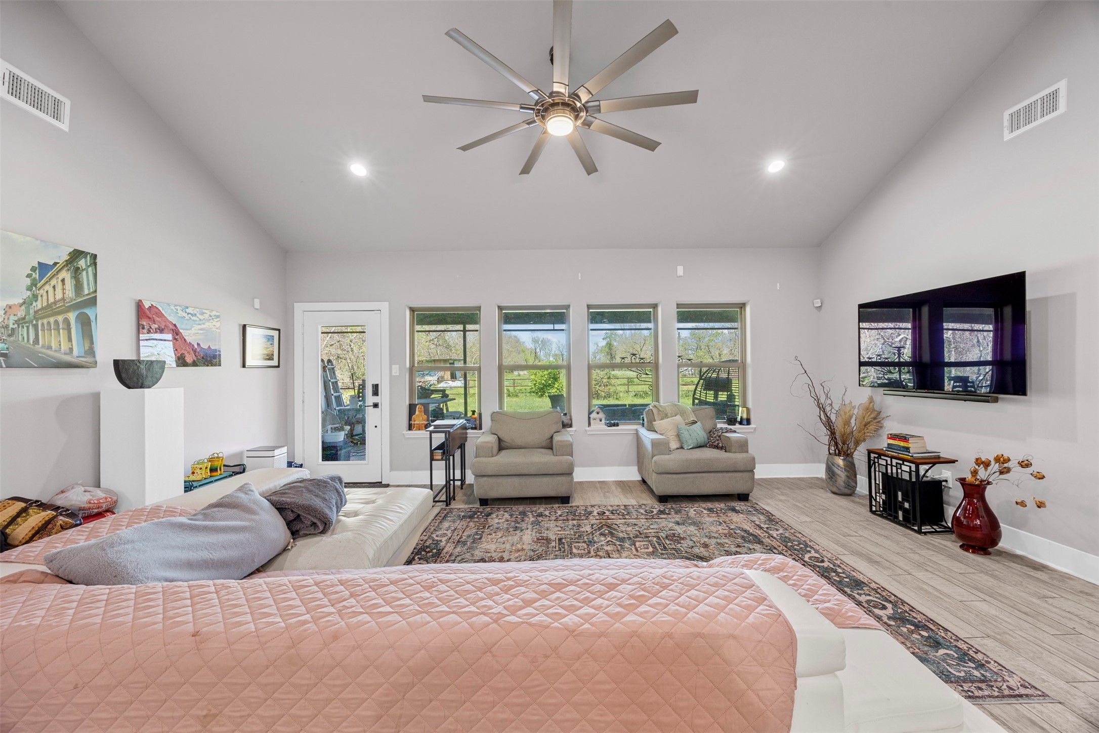 4425 Fuqua Street Houston, TX 77047 - Photo 17 of 49 a bedroom with furniture and a large window