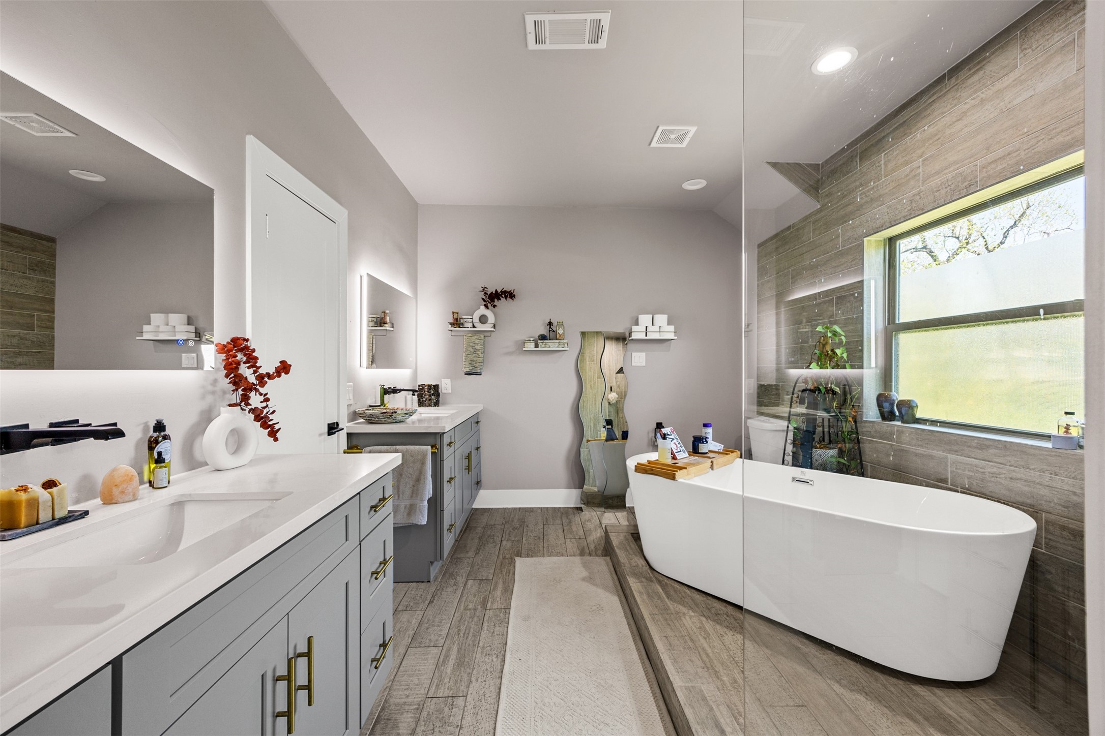 4425 Fuqua Street Houston, TX 77047 - Photo 25 of 49 a living room with furniture and a flat screen tv