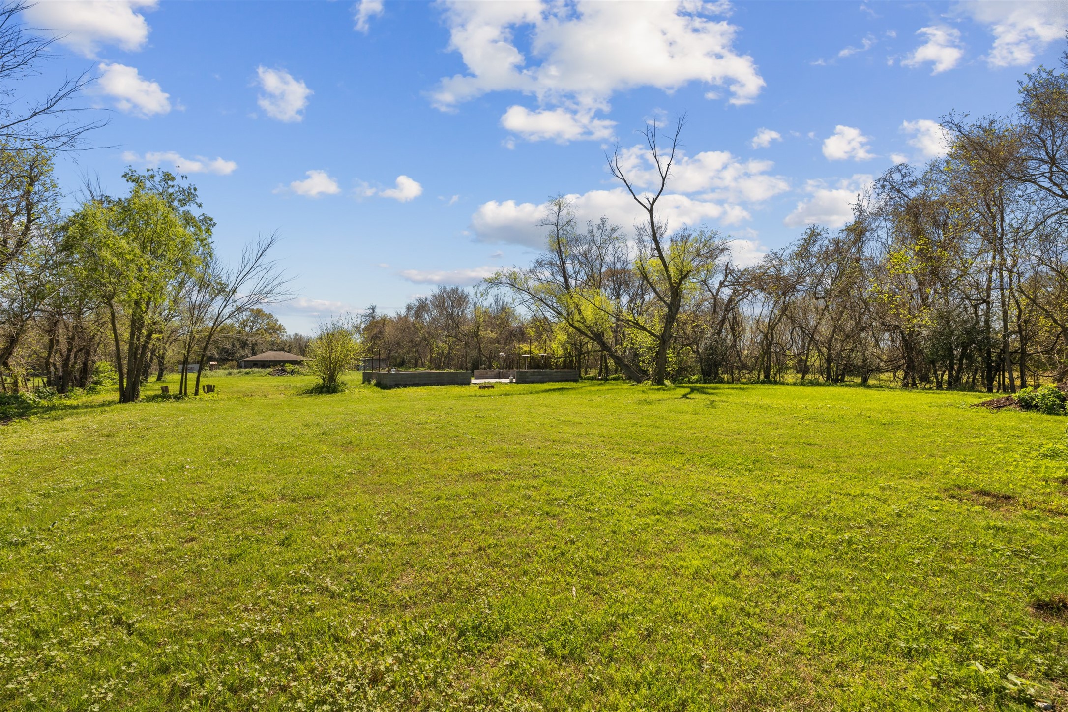 4425 Fuqua Street Houston, TX 77047 - Photo 34 of 49 a view of outdoor space with green field and trees