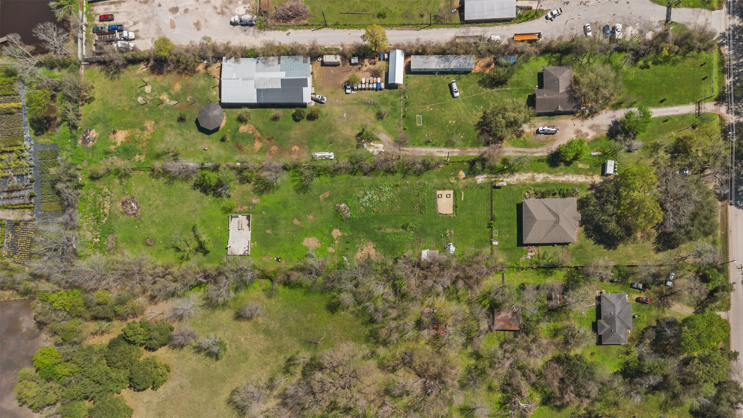 4425 Fuqua Street Houston, TX 77047 - Photo 40 of 49 an aerial view of residential houses with outdoor space