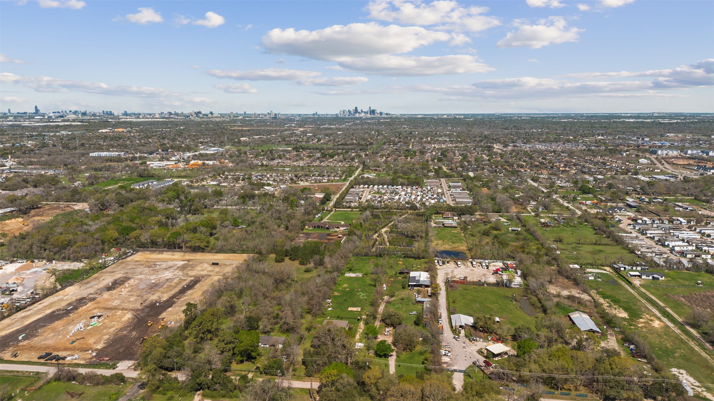 4425 Fuqua Street Houston, TX 77047 - Photo 44 of 49 an aerial view of residential building with parking space
