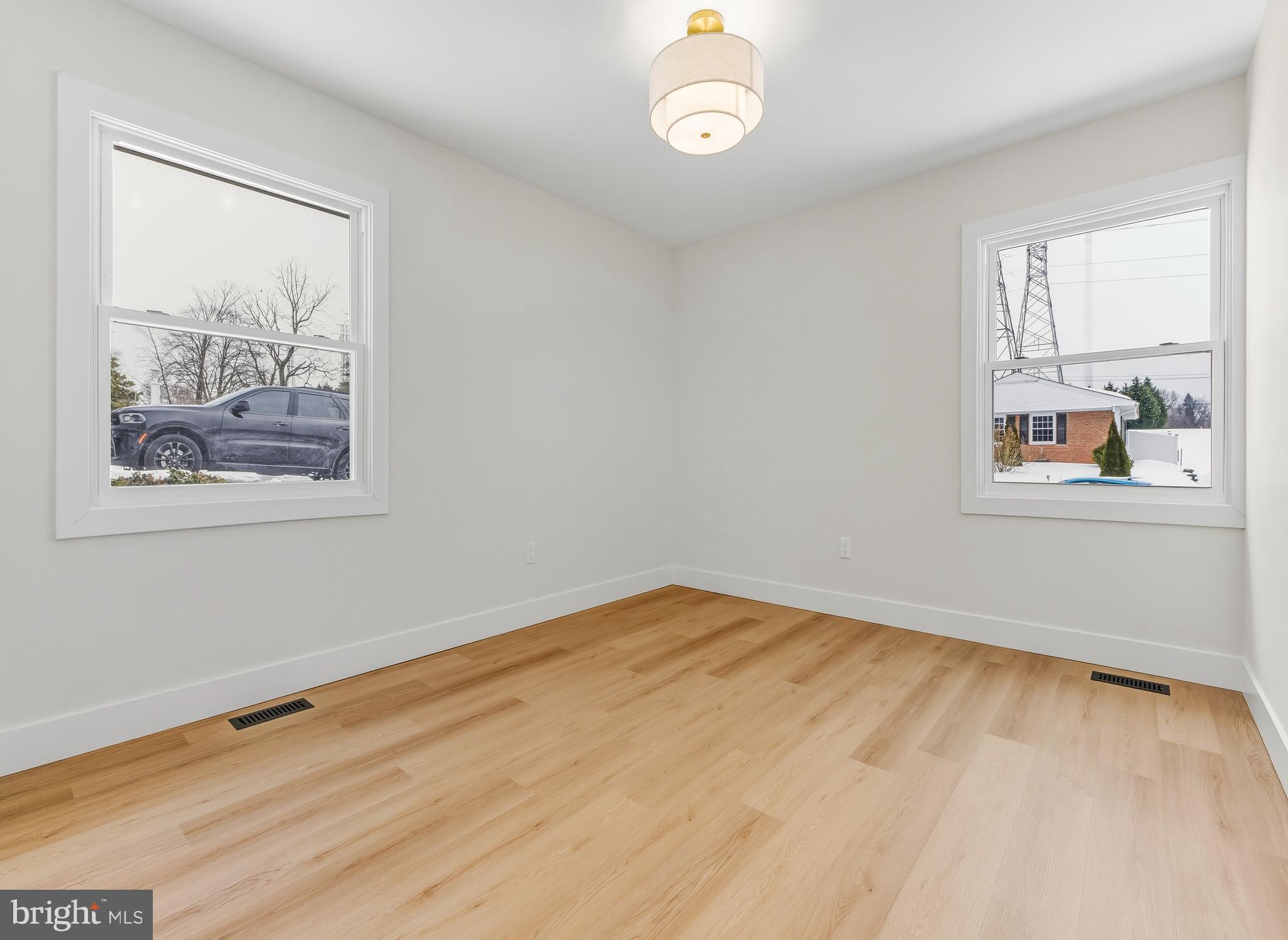 28 Country Club Road Willingboro, NJ 08046 - Photo 16 of 20 a view of empty room with wooden floor and fan