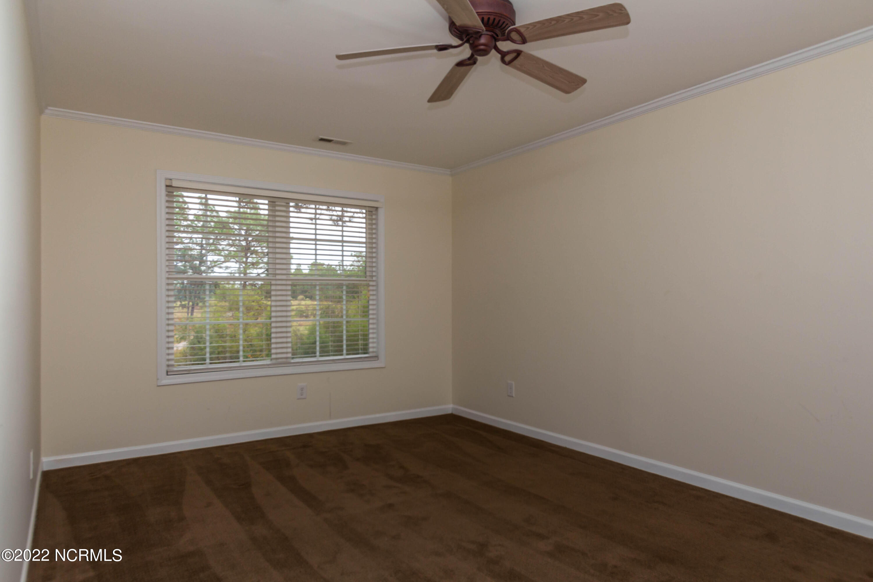 208 Old Course Road Aberdeen, NC 28315 - Photo 12 of 15 208 Bedroom 2 Window