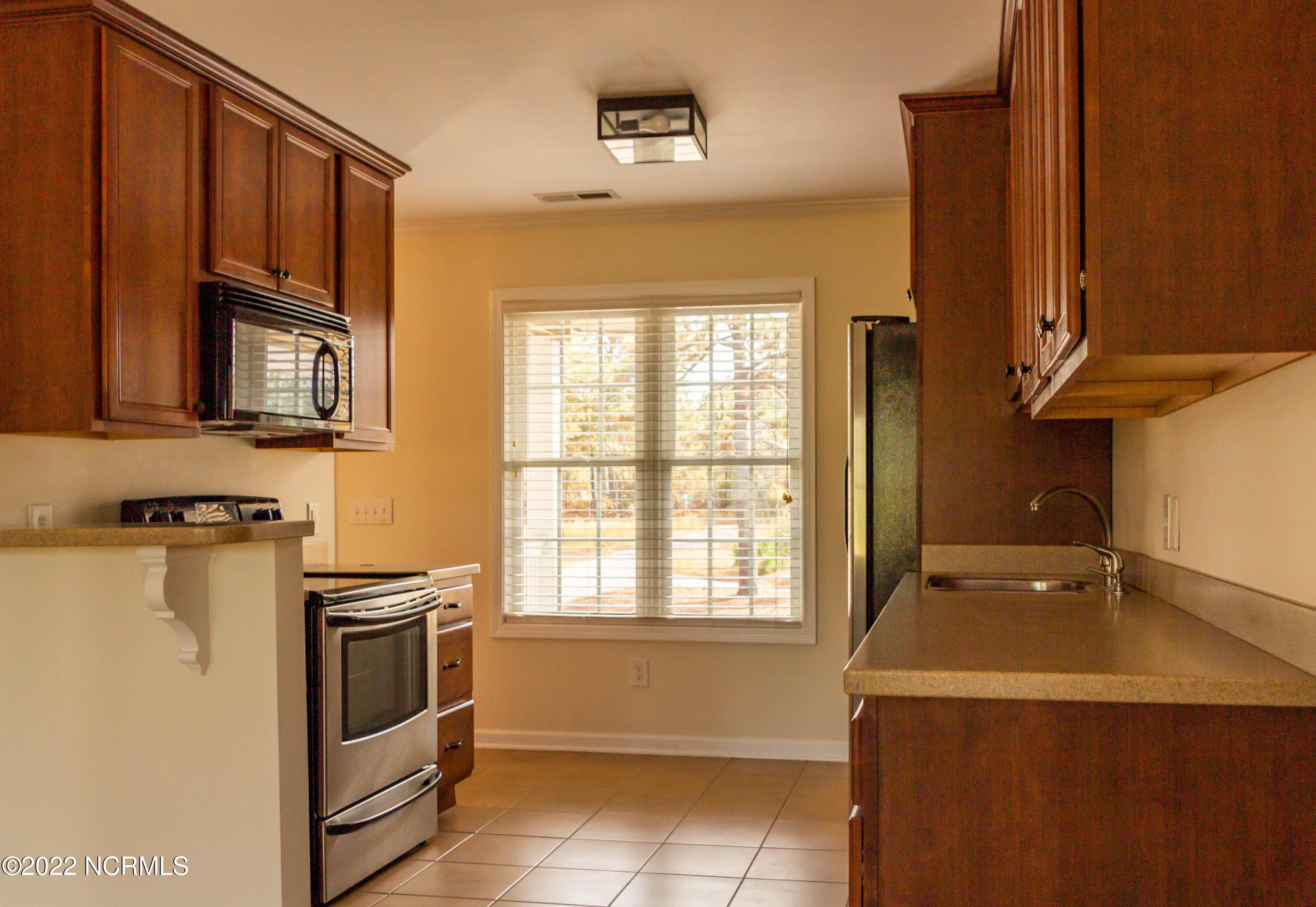 208 Old Course Road Aberdeen, NC 28315 - Photo 2 of 15 208 Kitchen Facing Front