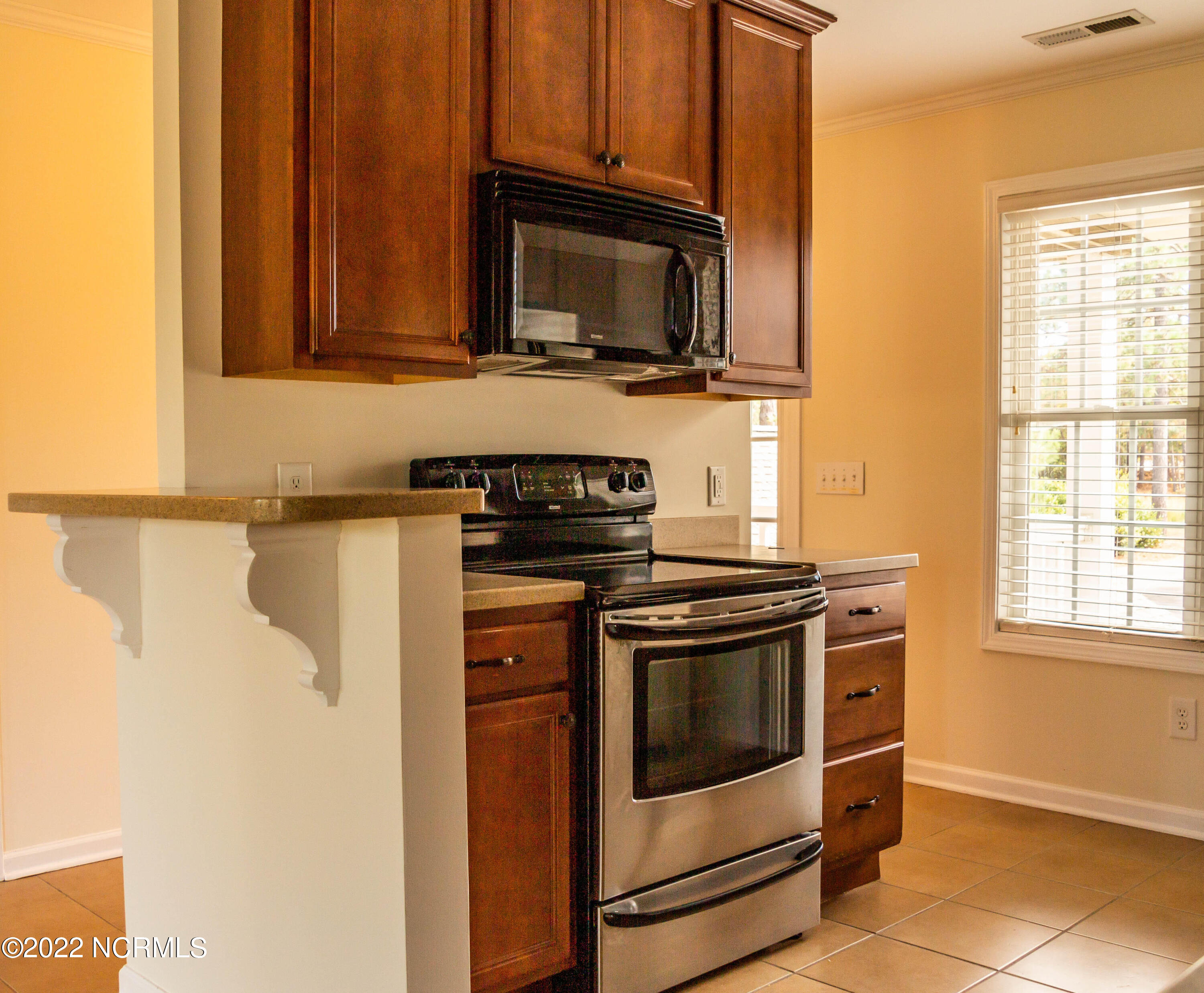 208 Old Course Road Aberdeen, NC 28315 - Photo 4 of 15 208 Kitchen Facing Stove