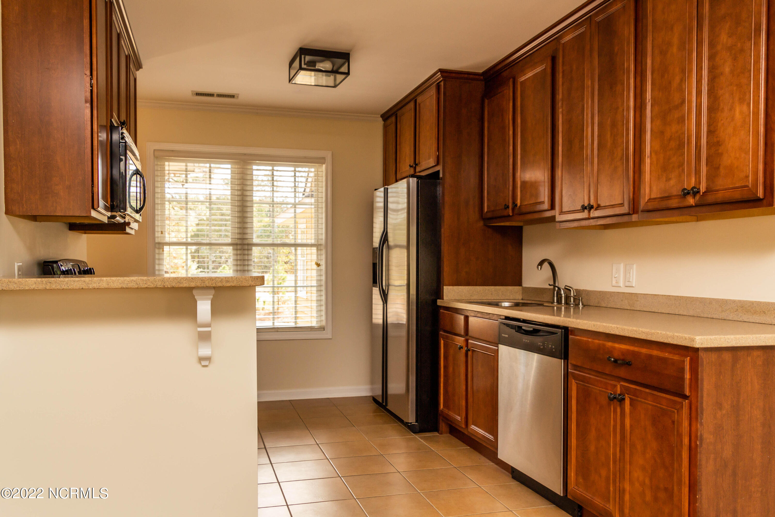208 Old Course Road Aberdeen, NC 28315 - Photo 7 of 15 208 Kitchen w Counter
