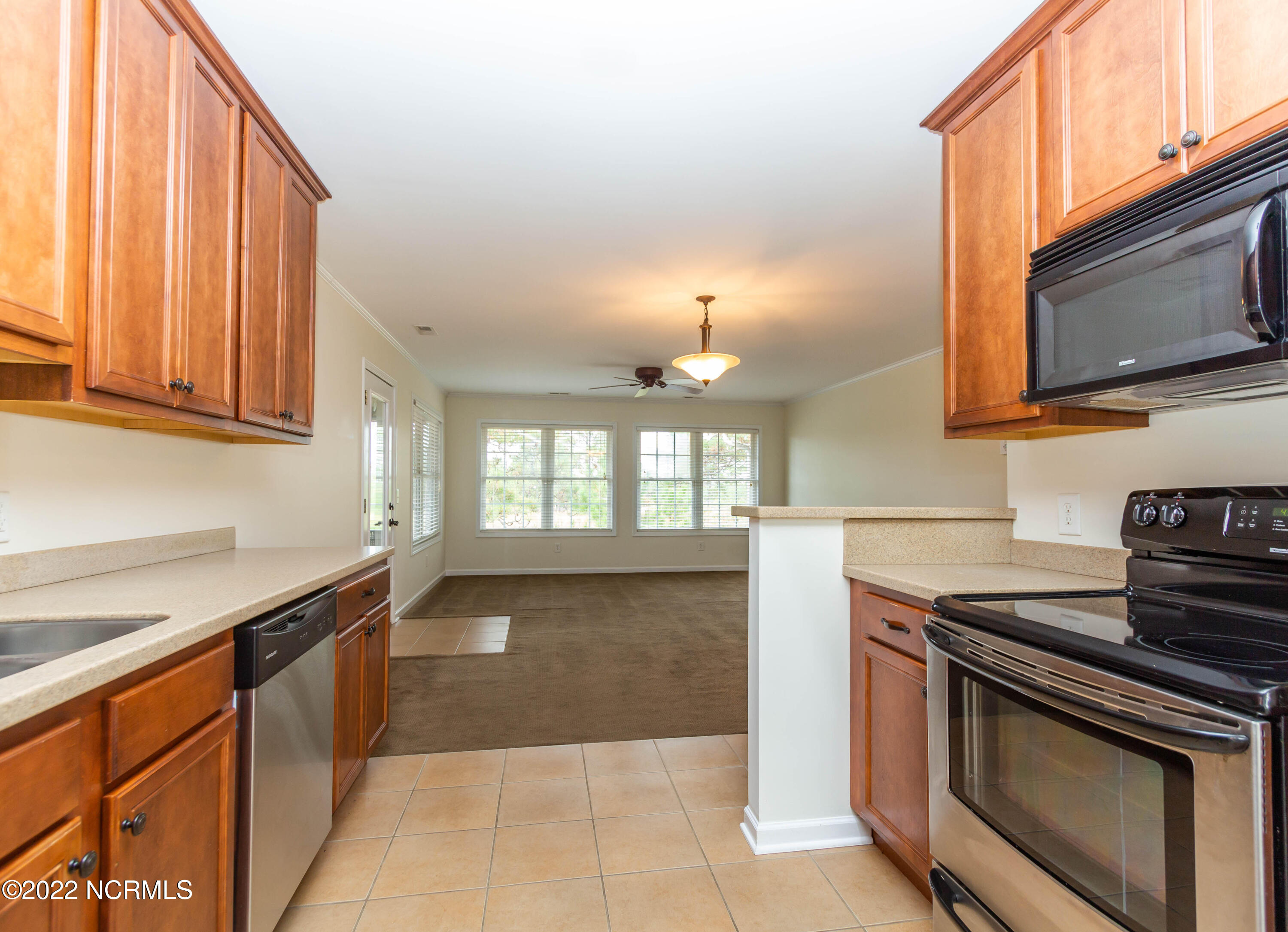 208 Old Course Road Aberdeen, NC 28315 - Photo 8 of 15 208 Kitchen Facing Living Room