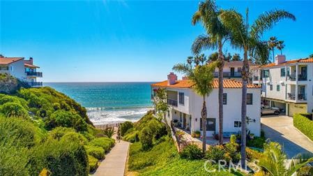 a view of a lake with a building in the background
