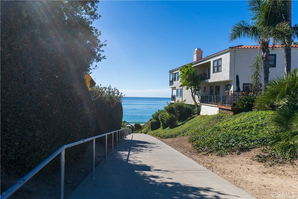258 West Escalones, Unit 6R San Clemente, CA 92672 - Photo 8 of 22 a view of a house with a yard