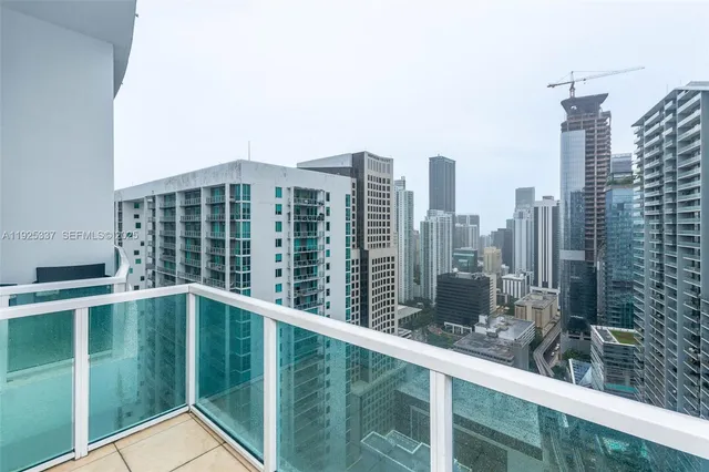 a view of a swimming pool with a lounge chairs