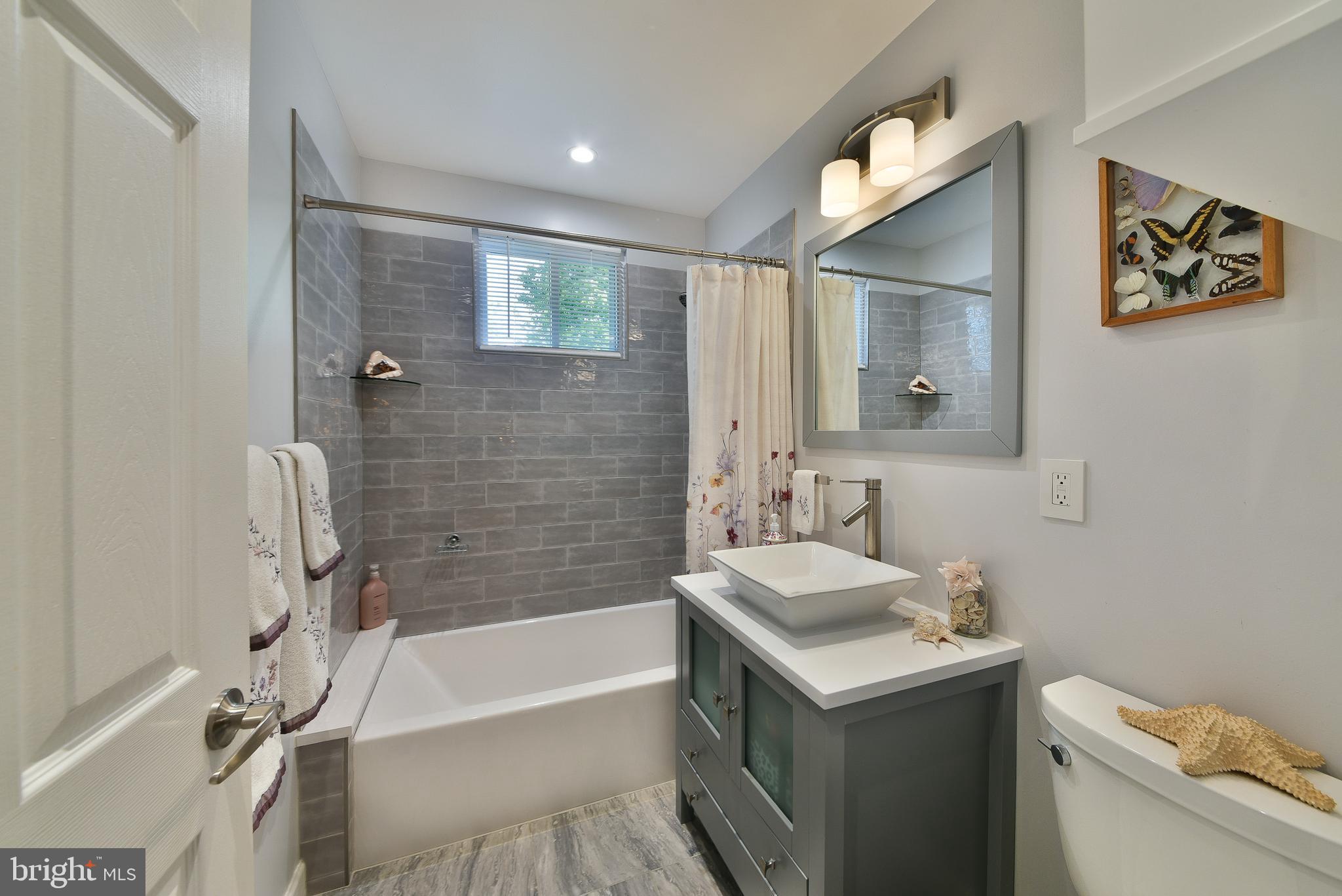 192 Bull Run Road Ewing, NJ 08638 - Photo 25 of 46 a bathroom with a sink toilet and shower