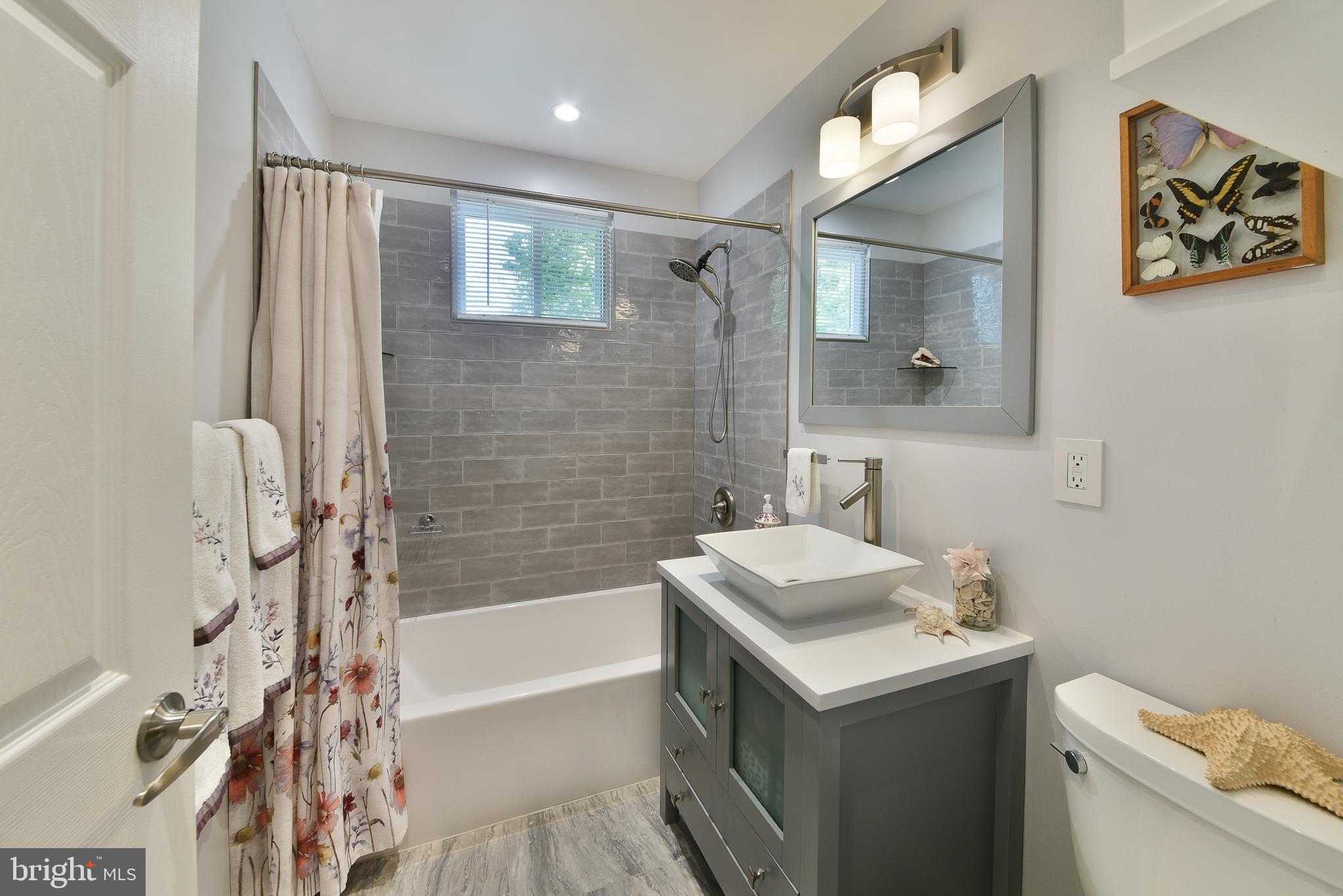 192 Bull Run Road Ewing, NJ 08638 - Photo 26 of 46 a bathroom with a sink toilet tub and shower