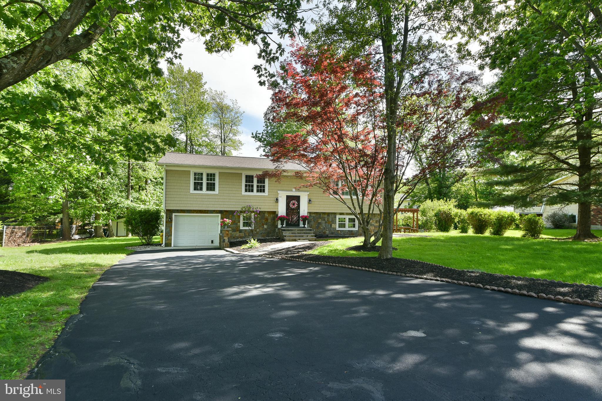 192 Bull Run Road Ewing, NJ 08638 - Photo 3 of 46 a view of a house with a tree in a yard