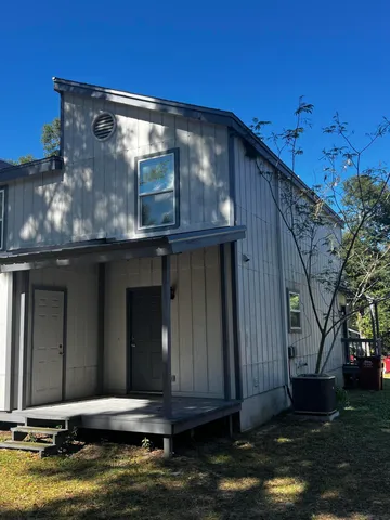 a view of a house with a small pool