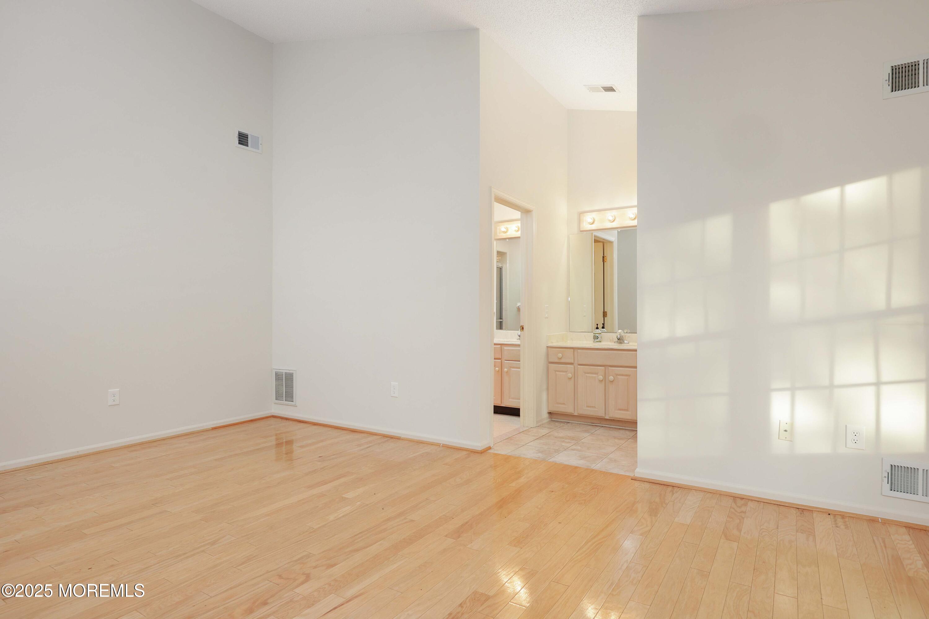1665 Goldspire Road Toms River, NJ 08755 - Photo 29 of 37 a bathroom with a sink and a mirror