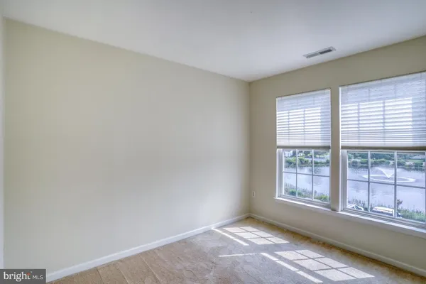 an aerial view of a house with a swimming pool