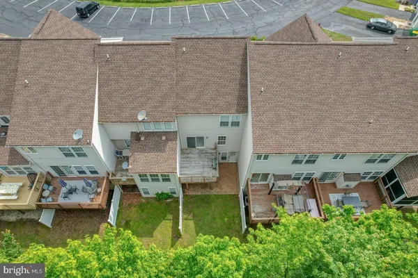 an aerial view of a house with garden space and outdoor space