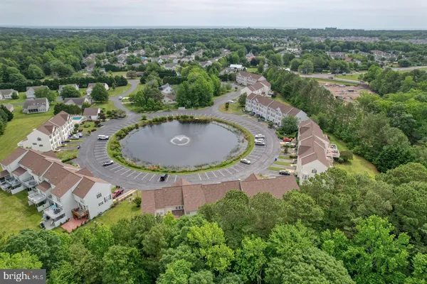 an aerial view of a house with a garden