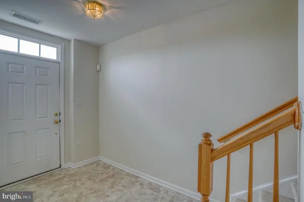a view of hallway with a window
