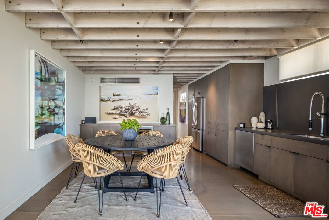 24956 Malibu Road Malibu, CA 90265 - Photo 18 of 33 a dining room with furniture and window