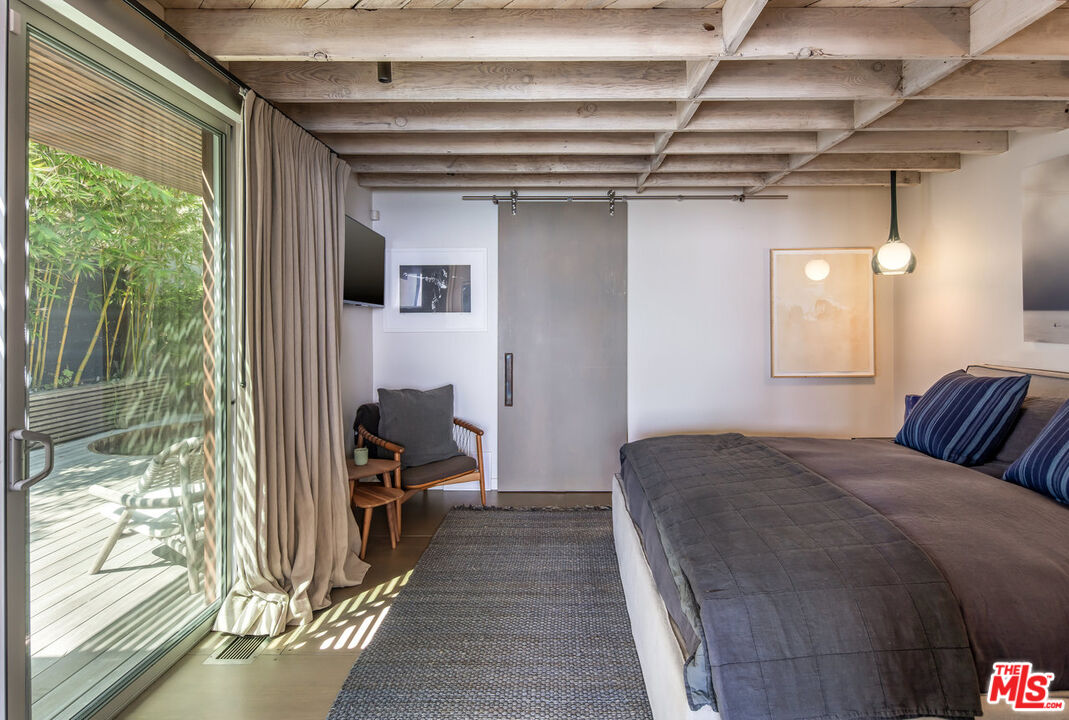 24956 Malibu Road Malibu, CA 90265 - Photo 23 of 33 a view of a bedroom from a balcony