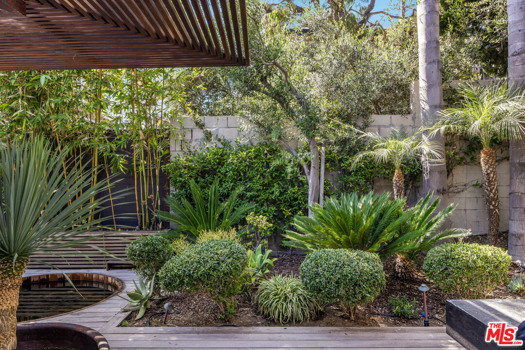 24956 Malibu Road Malibu, CA 90265 - Photo 26 of 33 a view of backyard with plants and outdoor seating