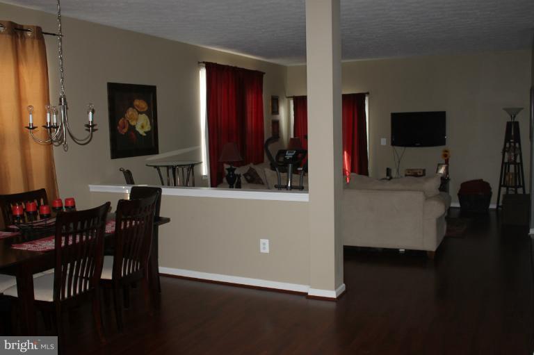 707 MacDill Road Baltimore, MD 21220 - Photo 9 of 20 a living room with furniture and a flat screen tv