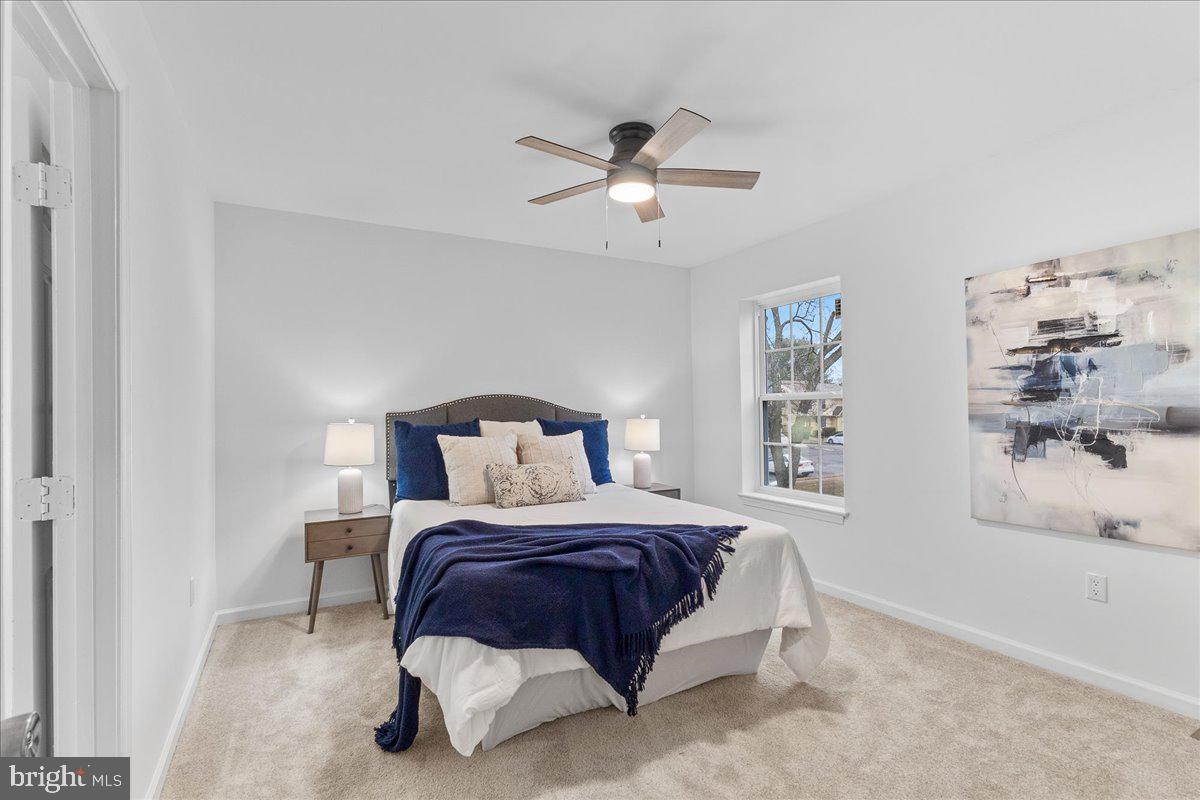 2227 Rock Creek Road Fredericksburg, VA 22407 - Photo 15 of 31 a bedroom with a bed and window