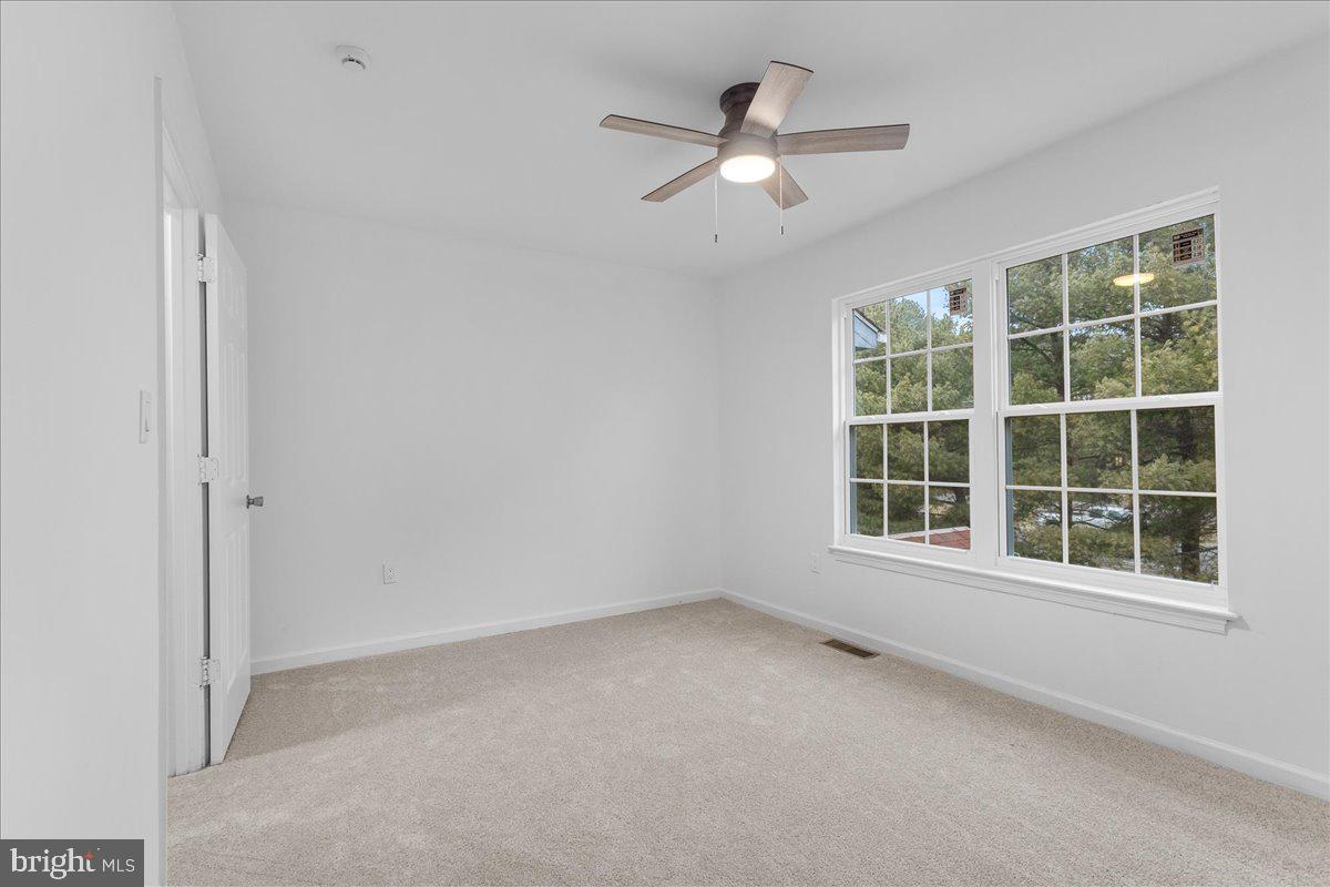 2227 Rock Creek Road Fredericksburg, VA 22407 - Photo 20 of 31 an empty room with a window