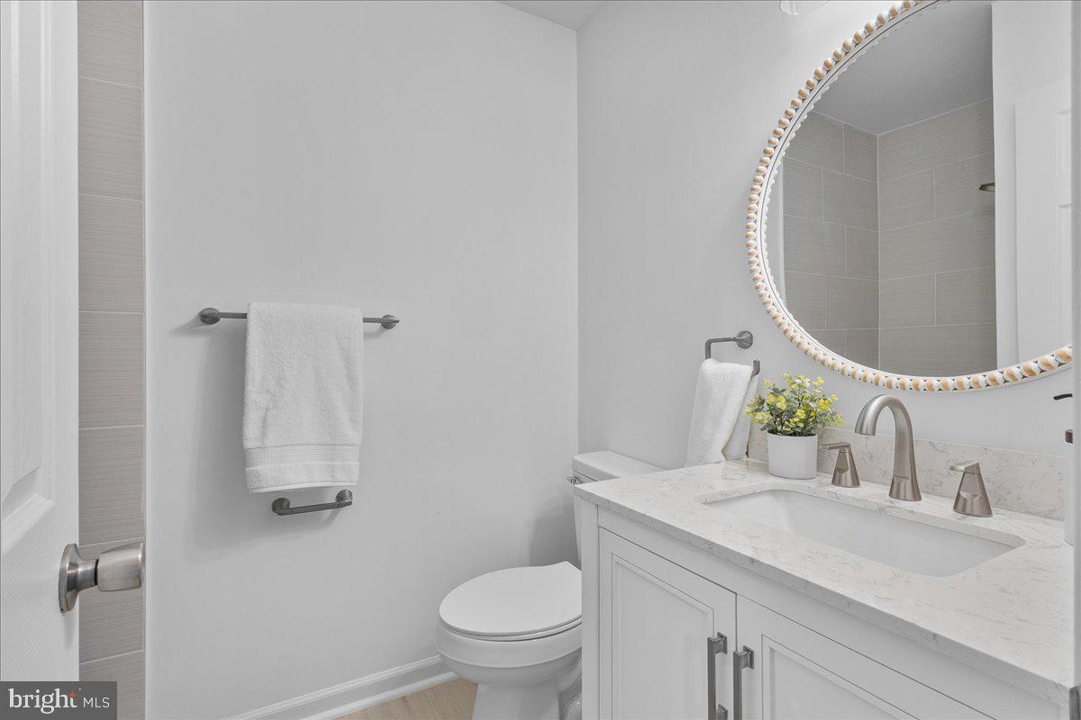 2227 Rock Creek Road Fredericksburg, VA 22407 - Photo 21 of 31 a bathroom with a sink and a mirror