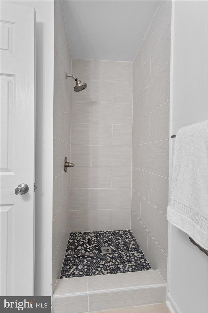 2227 Rock Creek Road Fredericksburg, VA 22407 - Photo 22 of 31 a bathroom with a bathtub