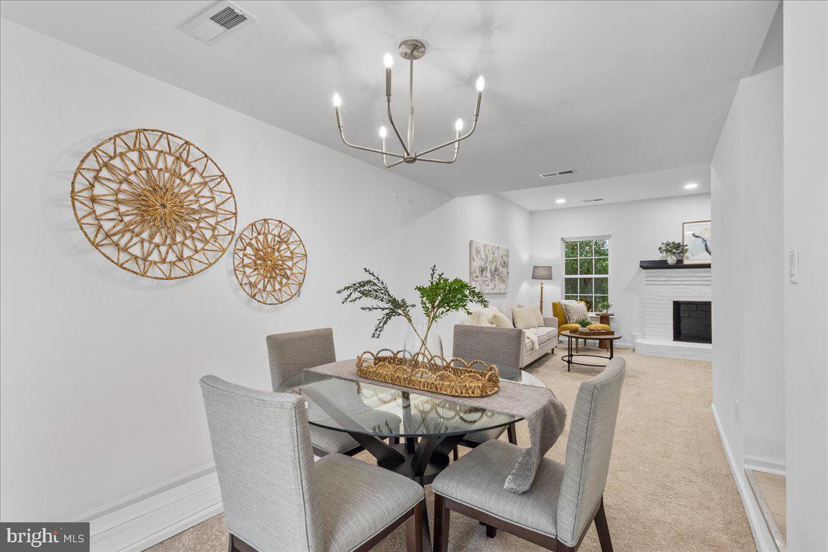 2227 Rock Creek Road Fredericksburg, VA 22407 - Photo 9 of 31 a view of a dining room with furniture
