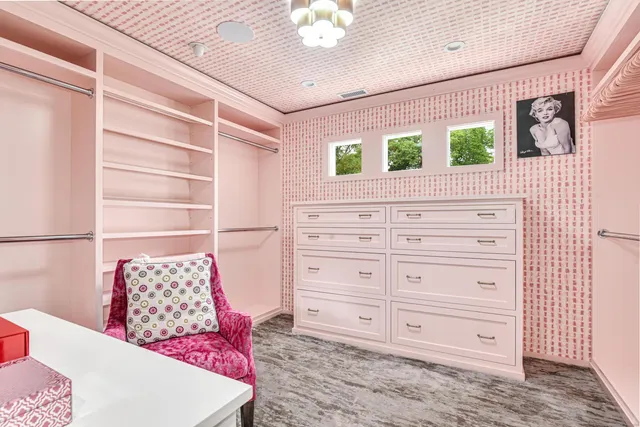 a view of bedroom with furniture and window