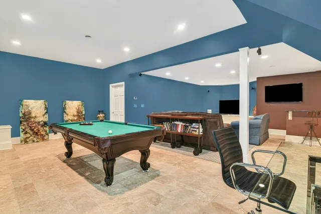 a room with furniture and a flat screen tv